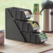 A black Choice 3-tier organizer with 3 bins and labels holding small items.