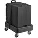 A CaterGator black insulated food pan carrier on a black dolly cart.
