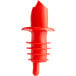 A red plastic Choice Free Flow Liquor Pourer with a white background.