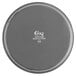 A grey round non-skid serving tray with white text.
