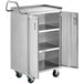 A Regency stainless steel utility cart with open shelves and two open doors.