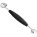 An OXO Good Grips black and silver ball shaped spoon with a handle.