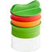 A green OXO plastic container with a red and green lid stacked on two other containers.