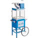 A blue and white Carnival King Royalty Series Sno-Cone Machine on a blue cart.