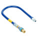 A blue Dormont gas connector hose with gold and blue connectors and a restraining cable.