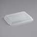 A white Baker's Mark plastic food container with a lid.