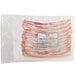 A package of Warrington Farm Meats smoked sliced bacon in a plastic bag.