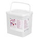 A white plastic bucket with a lid and a handle filled with Les Vergers Boiron red raspberry puree.