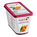 A container of yogurt with Les Vergers Boiron Corsican Clementine fruit puree on top.