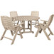 A POLYWOOD sand patio table with 4 folding chairs.
