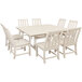 A white POLYWOOD dining table with chairs around it.