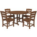 A POLYWOOD teak table with four chairs on an outdoor patio.