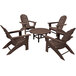 A POLYWOOD mahogany table with four chairs with a round top on a outdoor patio.