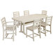 A white POLYWOOD dining table and chairs with a white background.