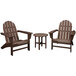 A round wooden table with a brown POLYWOOD Vineyard outdoor patio set of 2 Adirondack chairs.