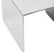 A white metal table with American Metalcraft stainless steel display risers.