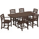 A POLYWOOD mahogany table with six brown chairs on an outdoor patio.