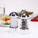 A Chef Specialties salt and pepper shaker set on a table.