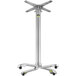 A silver metal FLAT Tech bar height table base with a yellow flip top mechanism.