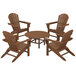A POLYWOOD table and chairs set with four Adirondack chairs in teak wood on an outdoor patio.