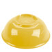 A yellow Thunder Group melamine bowl with a white circle on the inside.