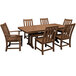 A POLYWOOD teak dining table with chairs on an outdoor patio.