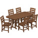 A POLYWOOD teak dining table with six chairs on an outdoor patio.