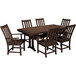 A POLYWOOD mahogany dining table and chairs on an outdoor patio.