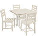A POLYWOOD white dining table and chairs with a curved seat.
