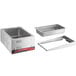 An Avantco stainless steel rectangular food pan with a lid and a handle inside a countertop warmer.