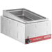 An Avantco countertop food warmer on a counter with a metal hotel pan inside.