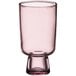 A pink Acopa Pangea goblet with a small foot on a white background.
