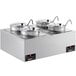 A silver ServIt countertop food warmer with rectangular adapter plates and 4 inset pots.