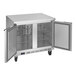 A stainless steel Beverage-Air worktop freezer with two doors open.