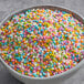 A bowl of Regal Mini Pastel Confetti Sequin Sprinkles.