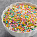 A bowl of Regal Pastel Confetti Sprinkles.