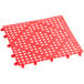 A red plastic Choice interlocking bar mat with holes.