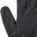 A close-up of a pair of small Cordova black work gloves with black foam nitrile palms.