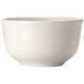A Libbey Basics white melamine bouillon cup with a handle on a white background.