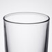 An Arcoroc beverage glass on a white background.
