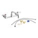 A chrome Regency wall mount faucet with 8" swing spout and install kit.