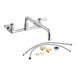 A Regency chrome wall mount faucet with install kit and 12" swing spout.