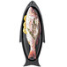 An Outset cast iron fish grill pan with a fish and herbs cooking in it.