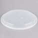 A Pactiv Newspring VERSAtainer round plastic lid with a white lid.