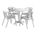 A Lancaster Table & Seating chrome square table with 4 silver arm chairs.