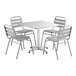 A Lancaster Table & Seating chrome square table with 4 silver chairs.