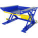 A blue and yellow Vestil scissor lift table with a remote power unit.