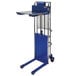 A blue Vestil Hefti-Lift cart with a metal shelf.