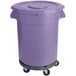 A purple plastic bin on wheels with a lid.