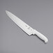 A Mercer Culinary Ultimate White chef knife with a white handle.